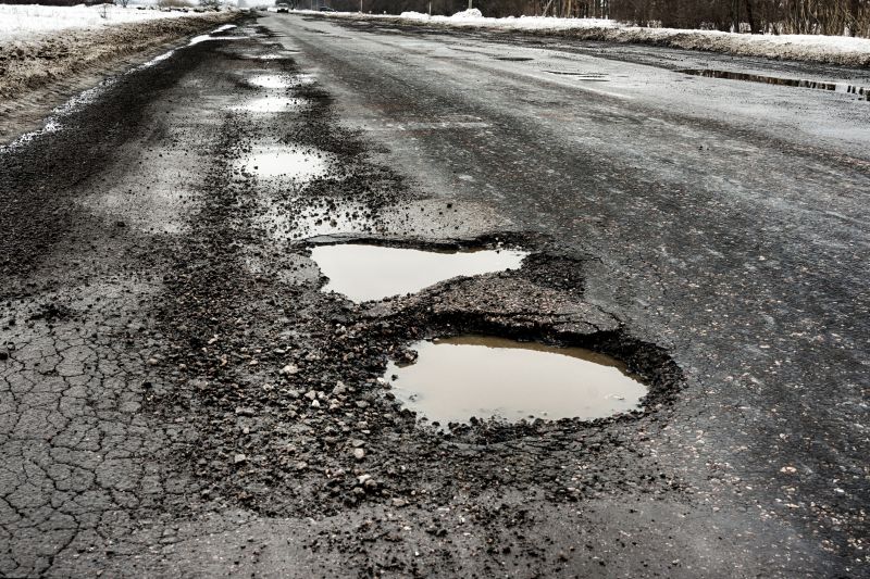 Pothole Formation on Dirt Roads